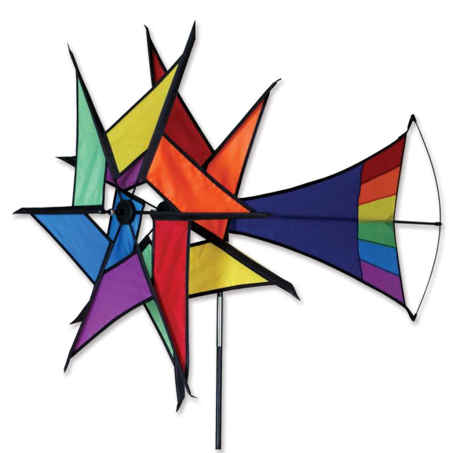 Large Rainbow Windstar Spinner displayed outdoors, showcasing vibrant colors and geometric design whirling in a gentle breeze.
