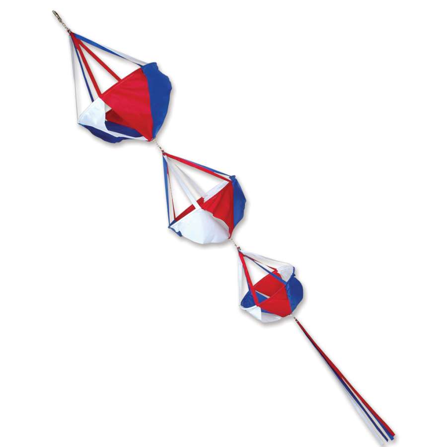 Large Spinnie Set - Patriotic featuring vibrant red, white, and blue spinnies with matching streamer tails displayed outdoors, spinning gracefully in the breeze.
