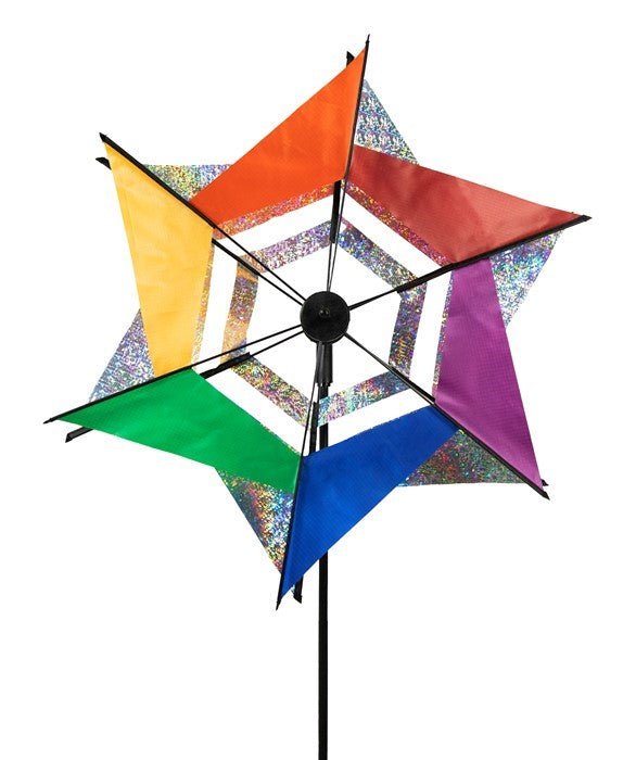 Laser Rainbow Kaleidoscope Ground Spinner featuring two colorful wheels spinning in a garden setting, designed for vibrant outdoor display.