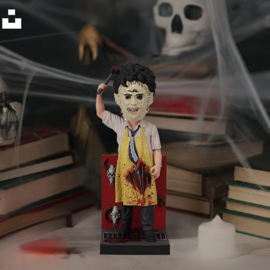 Leatherface - Killing Mask Bobblehead showcasing a detailed design of the character with a human skin mask, approximately 8 inches tall.