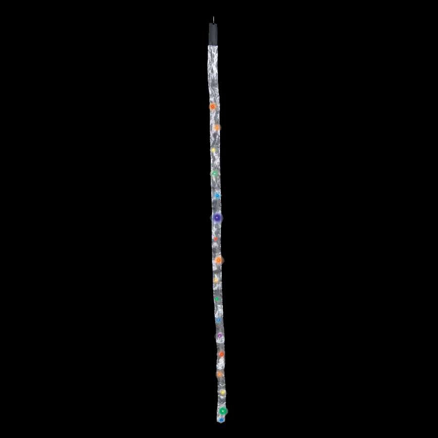L.E.D. Tail Light - Rainbow showcasing 17 colorful LEDs embedded in silver sheer fabric, lighting up a kite flying in a clear evening sky.