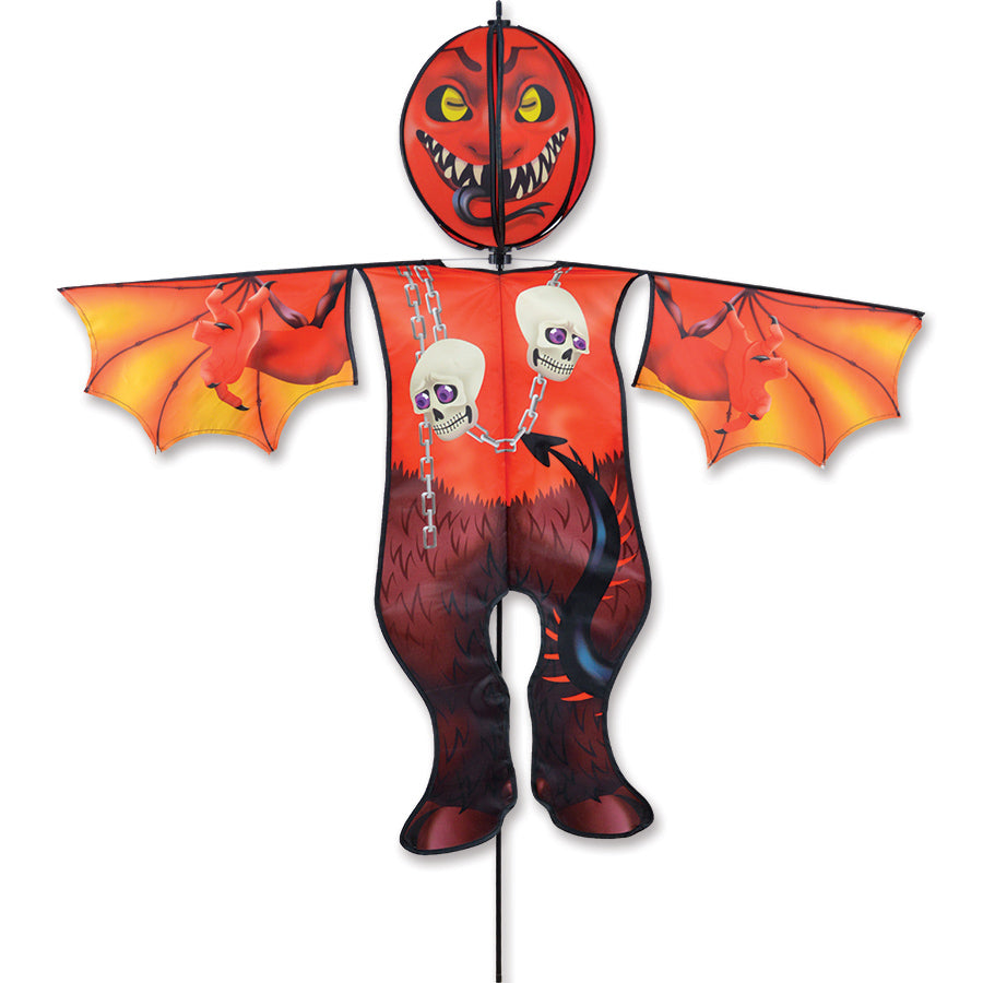 Lg. Spinning Friend - Devil with colorful spinning head displayed in a garden, made of weather-resistant flag fabric for Halloween decor.
