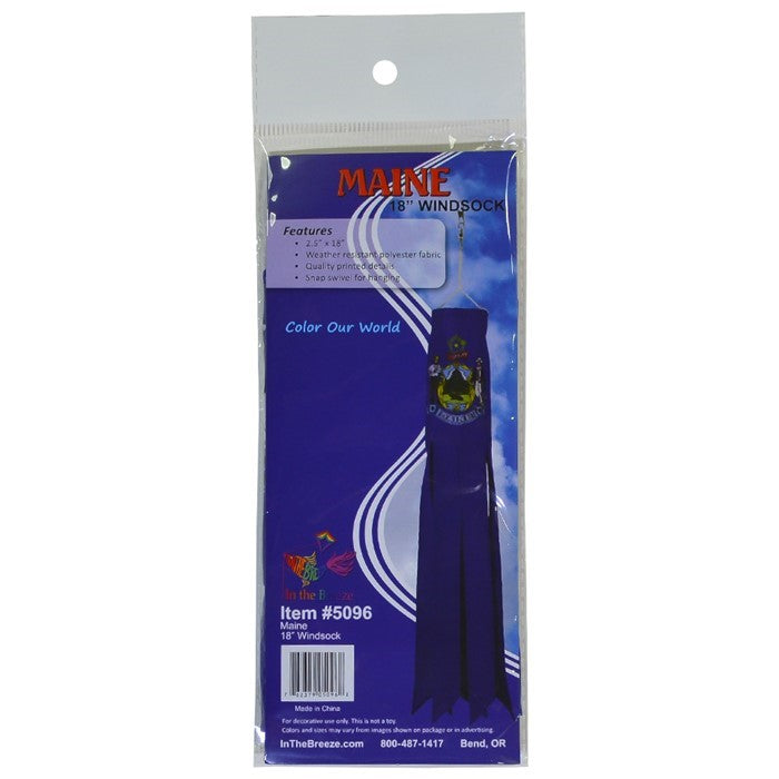 Maine 18-inch windsock featuring vibrant colors and six fluttering tails, displayed outdoors in a lush garden setting.