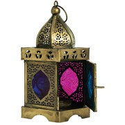 Medium Pink & Teal Square Glass Tealight Lantern showcasing intricate design, placed on a patio table with tealight candle inside.