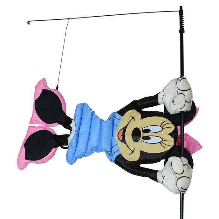 Minnie Mouse WindSical garden flag floats gracefully on a fiberglass pole, featuring vibrant colors and Minnie Mouse design in an outdoor setting.