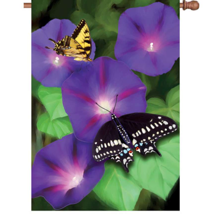 28-inch garden flag featuring colorful Morning Glory Swallowtails butterflies displayed outdoors, enhancing the garden's charm and beauty.