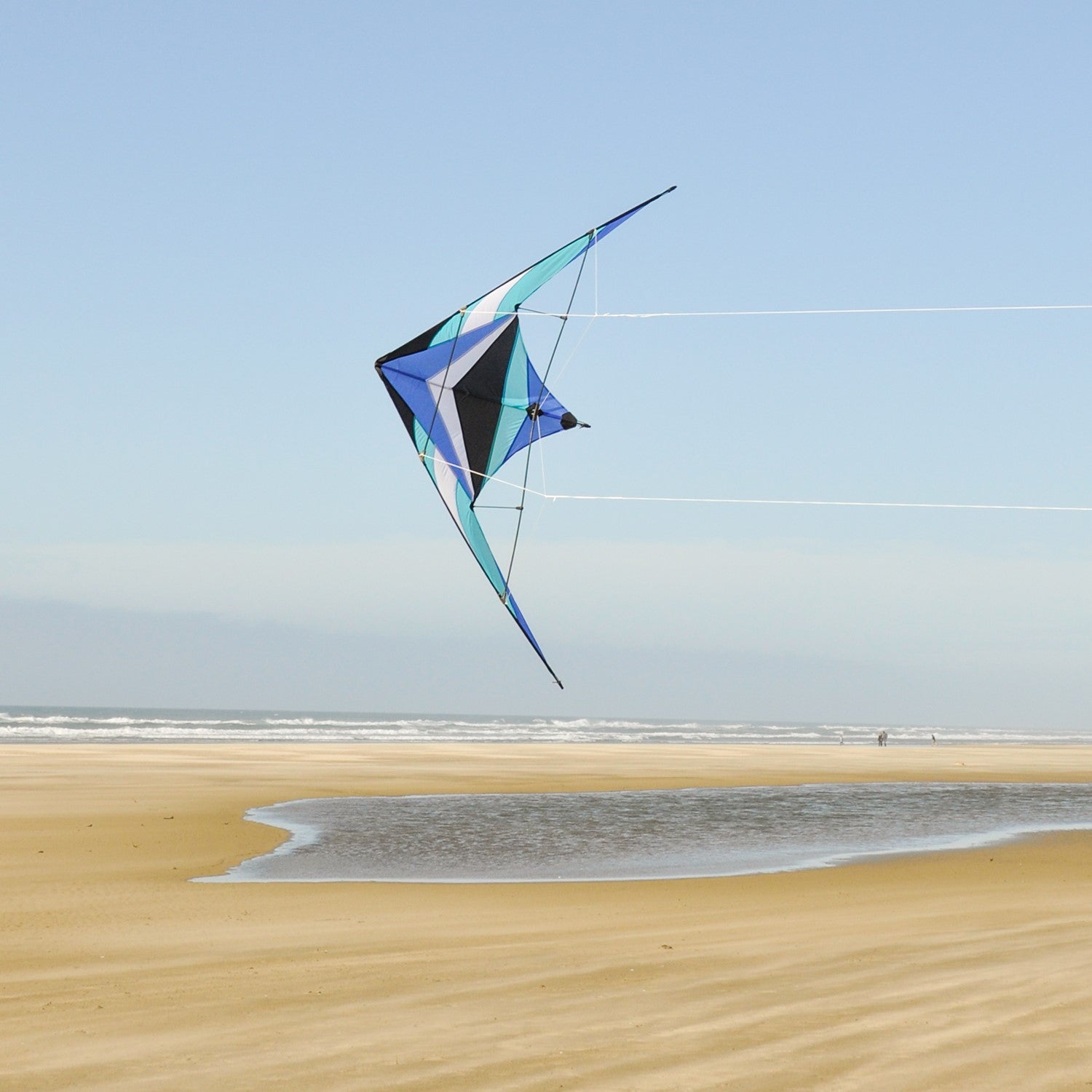 Ocean Breeze 68" Sport Kite with colorful design, shown soaring against a clear sky, perfect for outdoor fun, showcasing high-quality materials and craftsmanship.