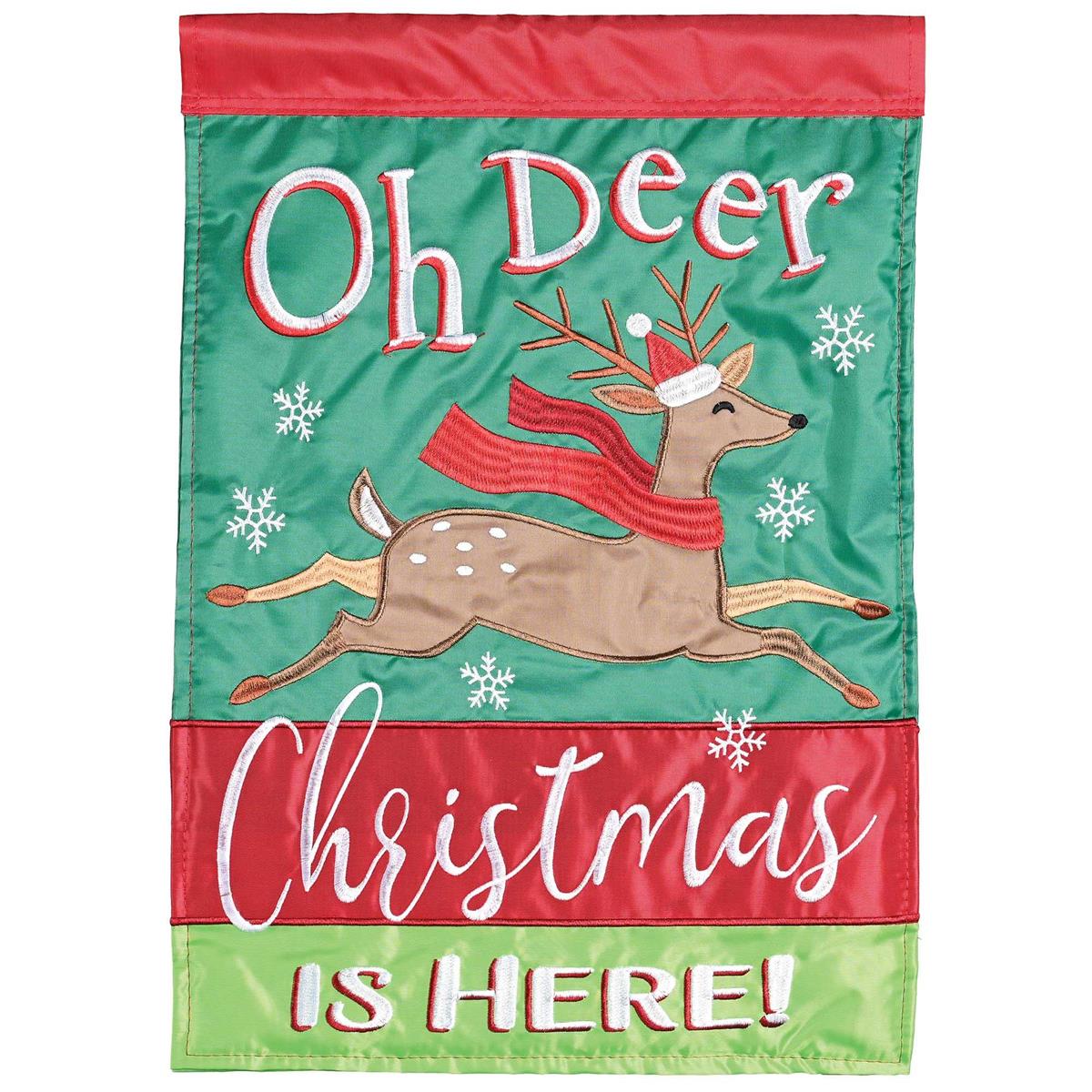 Oh Deer Christmas Is Here! double-sided garden flag featuring festive designs displayed on a pole in a cheerful outdoor setting.