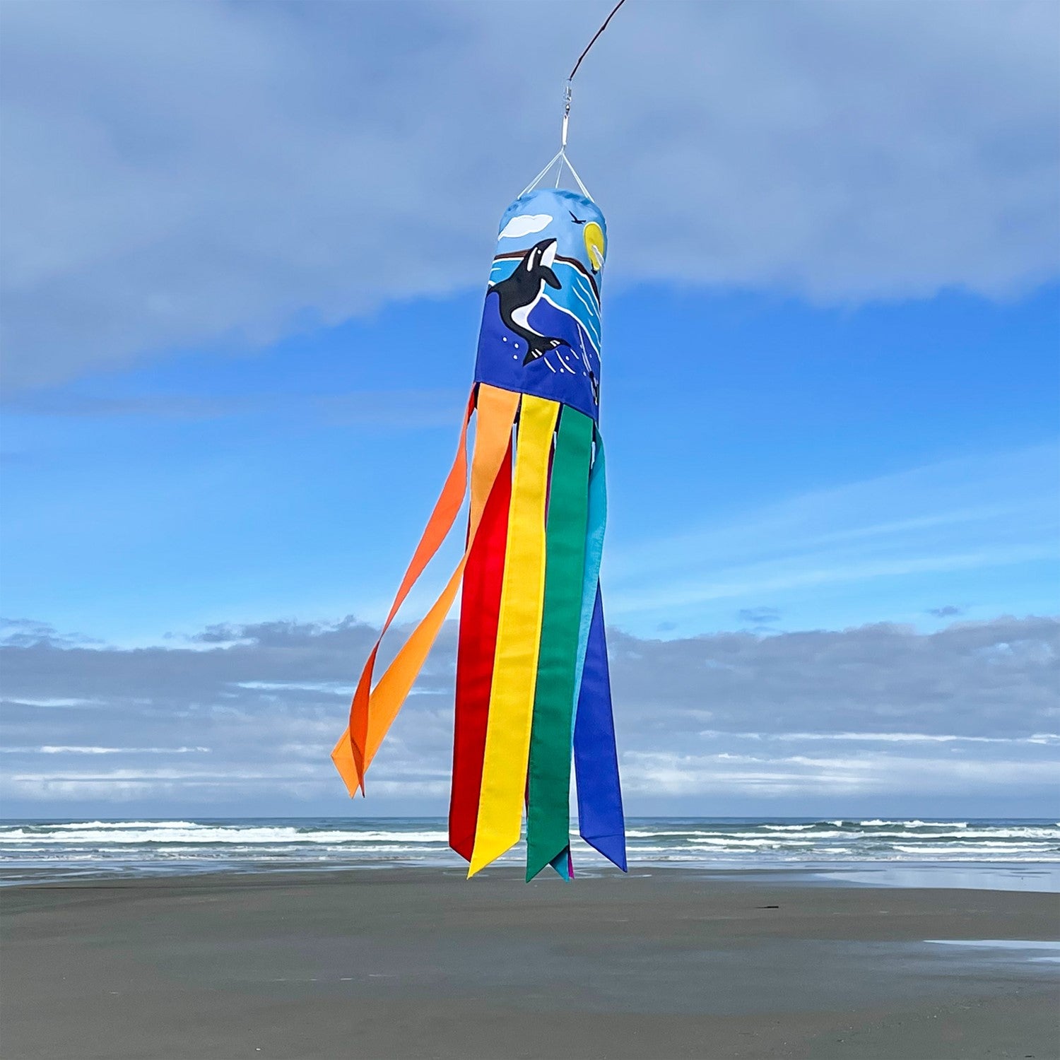 Orca Whale 40-inch windsock featuring colorful appliqued graphics and embroidered details, elegantly displayed outdoors.