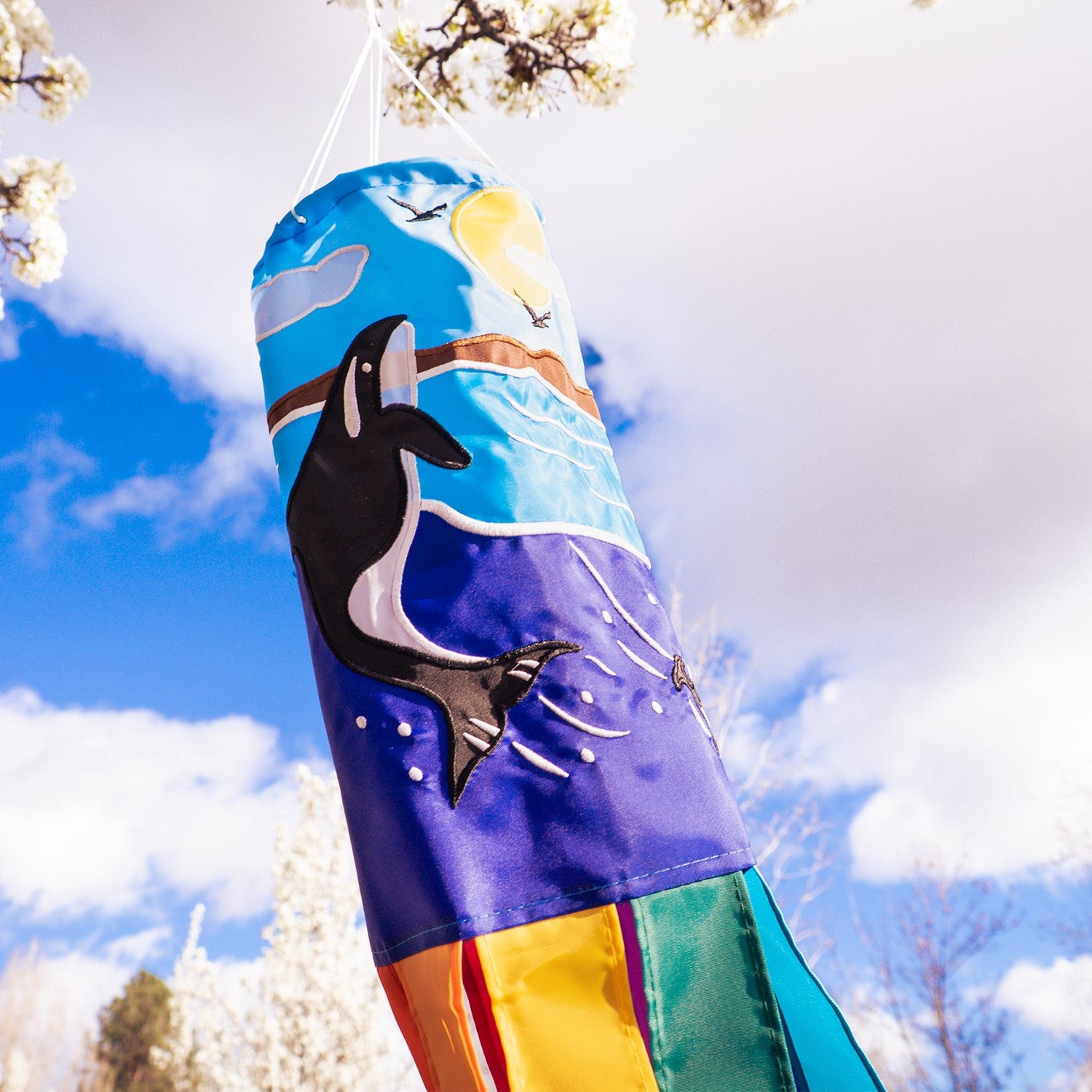 Orca Whale 40-inch windsock featuring colorful appliqued graphics and embroidered details, elegantly displayed outdoors.