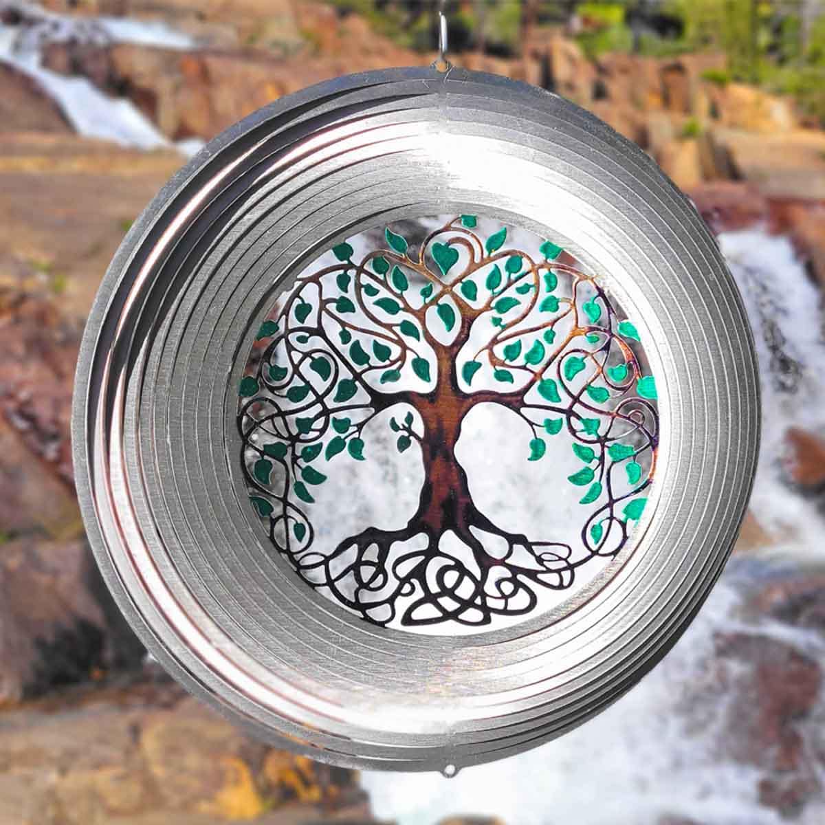 Outdoor 12" Tree of Life Wind Spinner made from powder-coated stainless steel, featuring a symbolic tree design and dynamic motion for elegant outdoor décor.