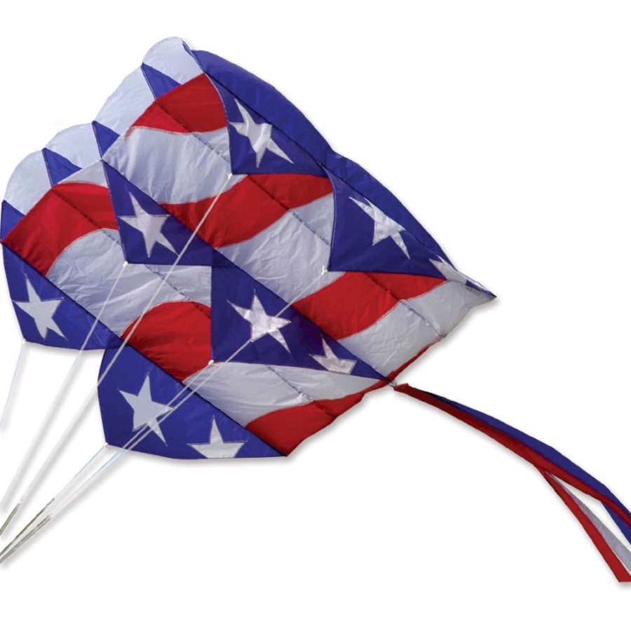 Parafoil 7.5 Kite in vibrant colors flying against the blue sky, measuring 28 x 38 inches, ready for outdoor adventure.