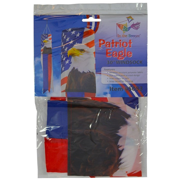 Patriot Eagle 30\" Windsock showcasing a vibrant bald eagle and stars and stripes design hanging in a garden setting.
