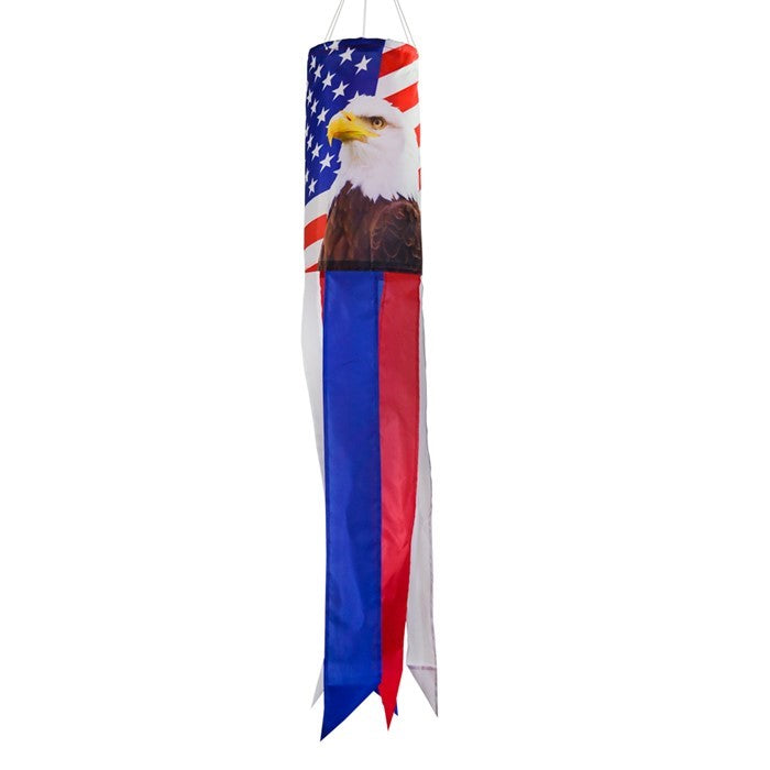 Patriot Eagle 30\" Windsock showcasing a vibrant bald eagle and stars and stripes design hanging in a garden setting.