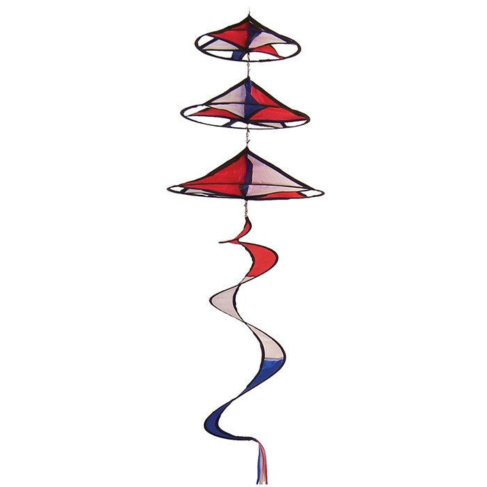 Patriot Triple Magic Star garden spinner in red, white, and blue with a twister tail, spinning in the breeze, enhancing outdoor decor.