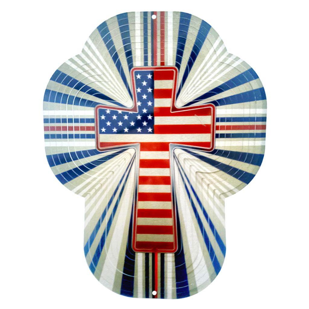 Patriotic Cross Wind Spinner featuring vivid colors and intricate design, displayed in a garden setting with gentle winds creating motion.