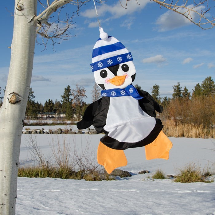 Penguin Wind Friend fluttering outdoors, bringing a playful and festive touch to your garden or porch, perfect for winter or holiday decorations.