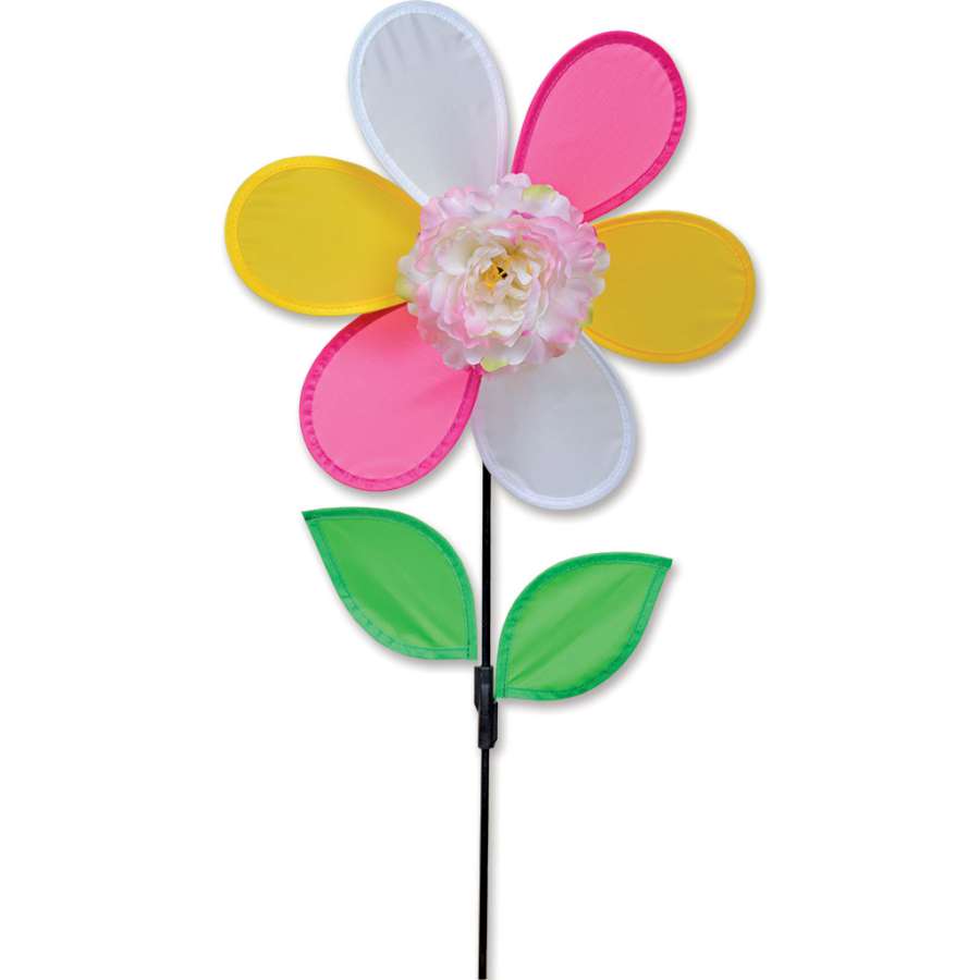 Colorful Peony Spinner swirling in the garden, showcasing intricate floral design and vibrant colors against a blue sky.
