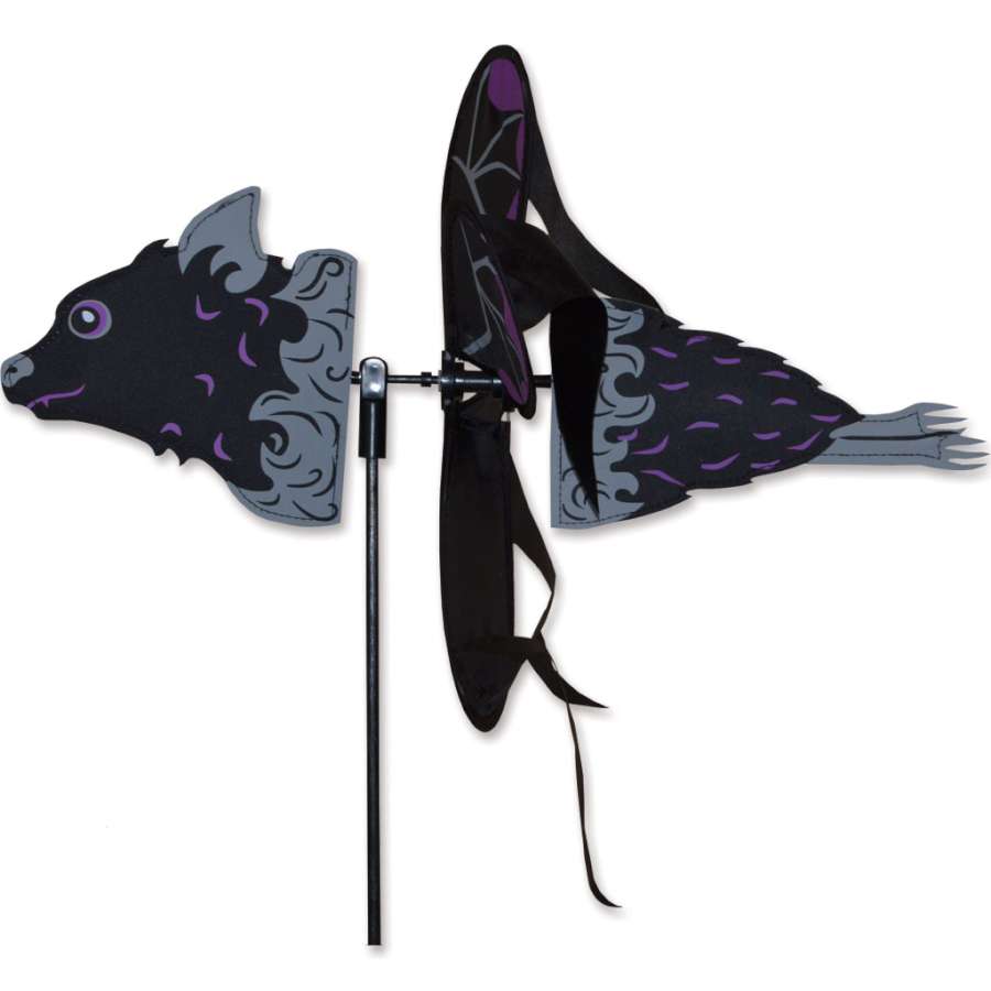 Petite Spinner - Bat featuring a whimsical bat design, spinning gracefully in a garden setting with colorful flowers.