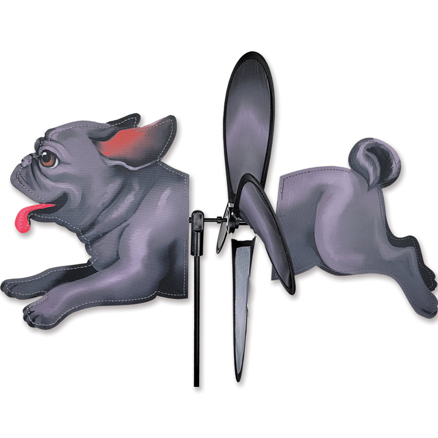 Petite Spinner - Black Pug featuring a cute pug design, gently spinning in an outdoor garden setting, crafted from durable polyester fabric.