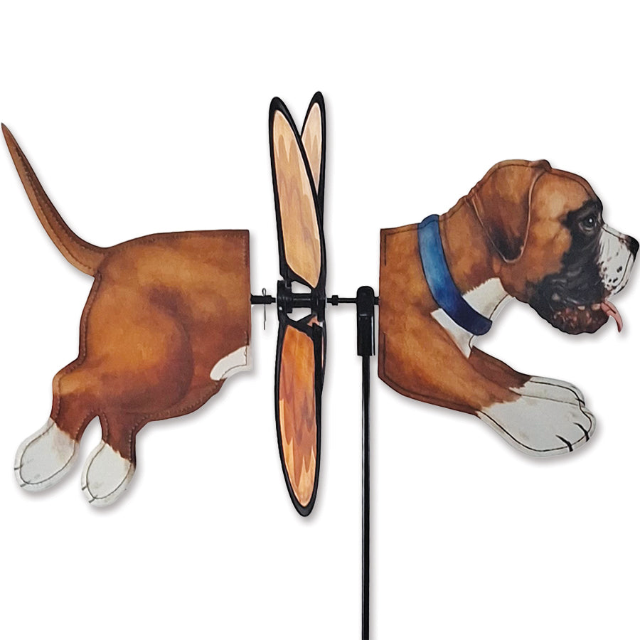 Petite Spinner - Boxer dog garden decoration, made of durable polyester, displaying its whimsical design in a vibrant outdoor setting.