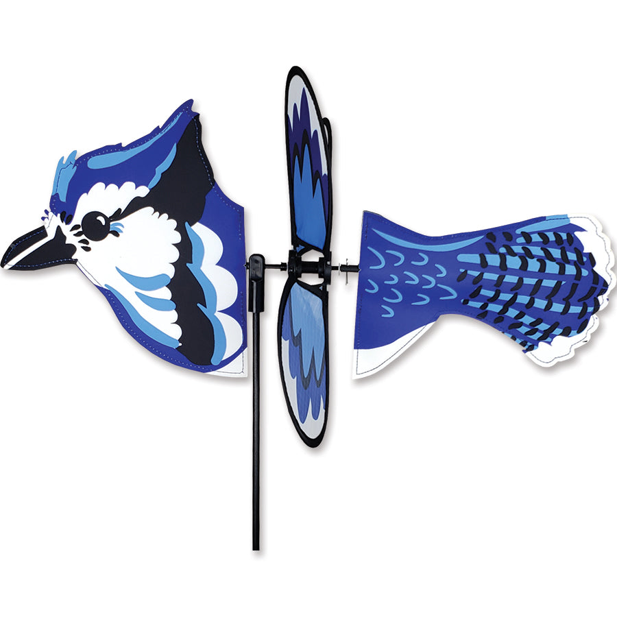 Petite Spinner - Flying Blue Jay featuring vibrant blue jay design, spinning gracefully in a garden setting, adding whimsical charm to outdoor decor.