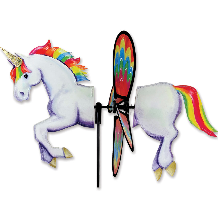 Petite Spinner - Unicorn in vibrant colors spinning in the breeze, adding charm to a colorful garden setting.