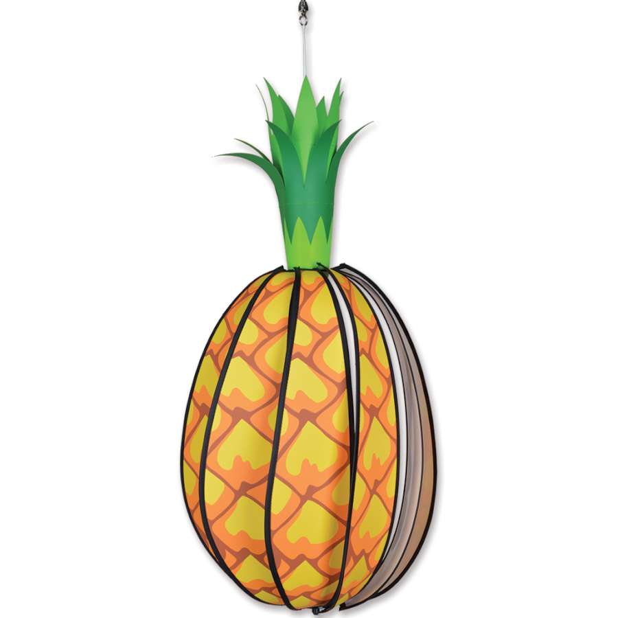 Vibrant Pineapple Spinner garden decoration rotating in the breeze amidst colorful flowers in an outdoor setting.