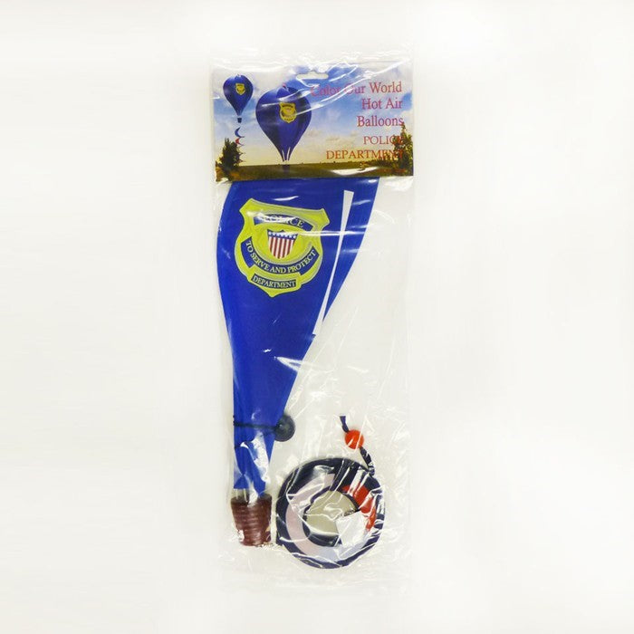 Police Hot Air Balloon decoration with Police Service logo on a blue background, spinning in the breeze, displayed in a garden setting.