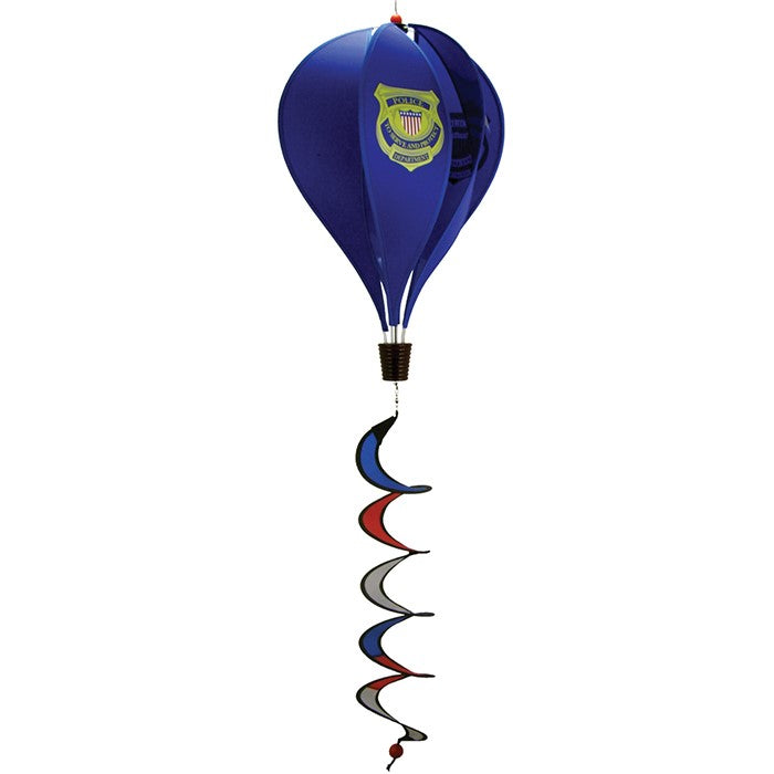 Police Hot Air Balloon decoration with Police Service logo on a blue background, spinning in the breeze, displayed in a garden setting.