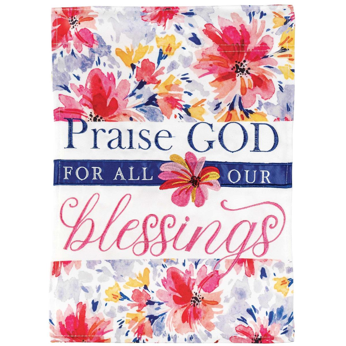 Praise God Blessings double-sided banner flag displaying intricate embroidery and fabric appliques, hanging in an outdoor space.