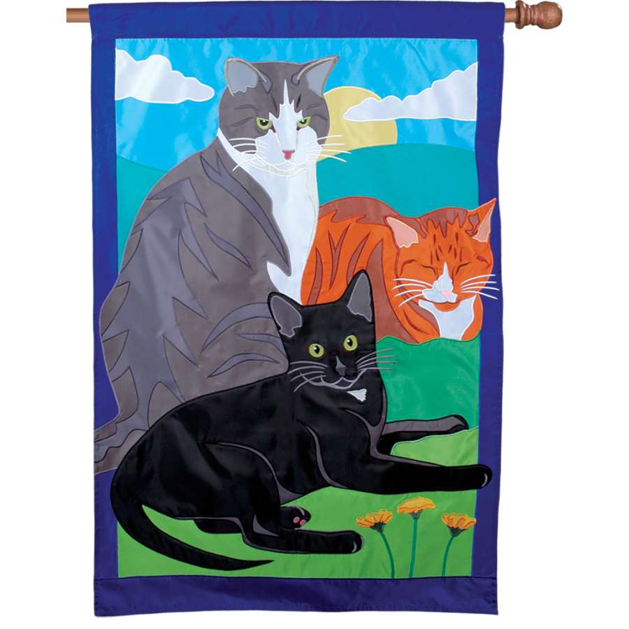 Prestige Flag - Kitty, Kitty, Kitty oversized house flag featuring colorful kitty designs, displayed on a flagpole in a charming garden setting.