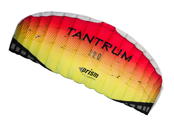 Prism Tantrum 220 dual-line parafoil kite with bar control, low-drag airfoil, Dyneema lines, and safety leash for high-speed traction flying.