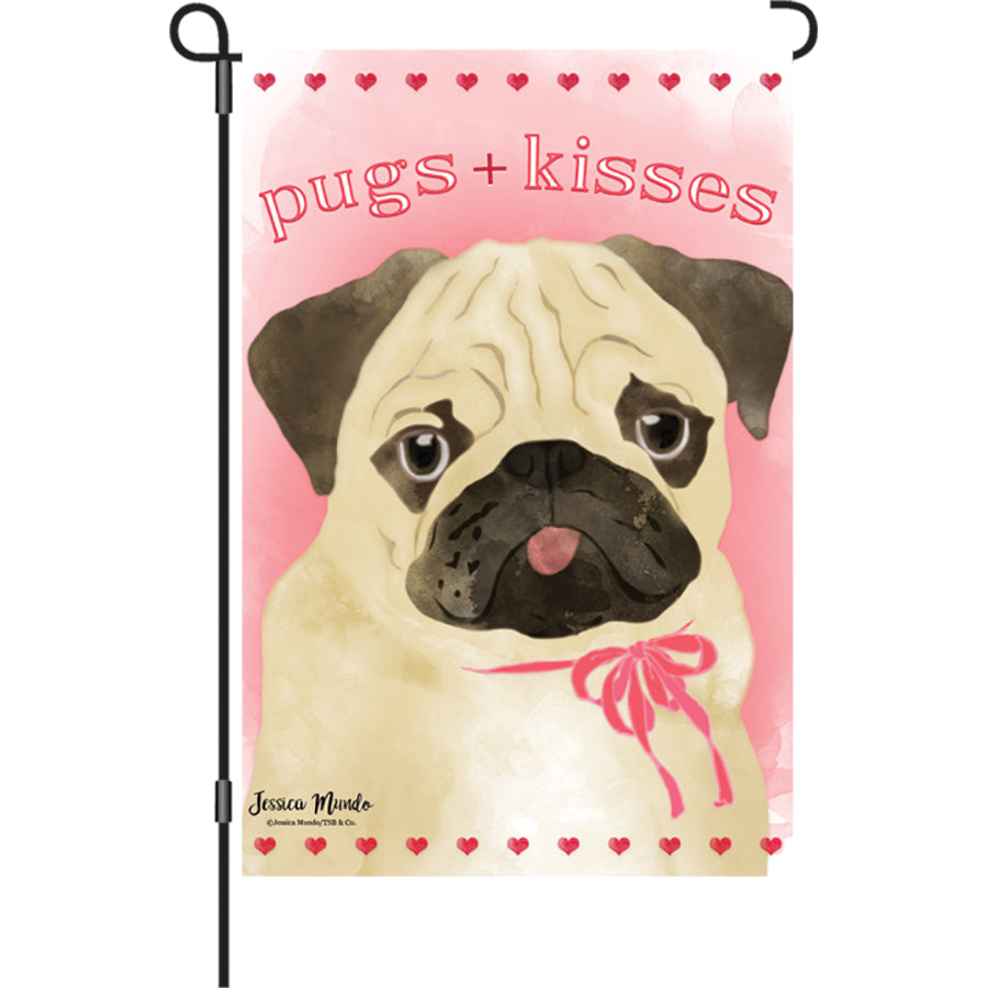 12 in. garden flag featuring a tan pug and the phrase 'Pugs + Kisses' printed in vibrant colors on PremierSoft fabric, displayed outdoors.