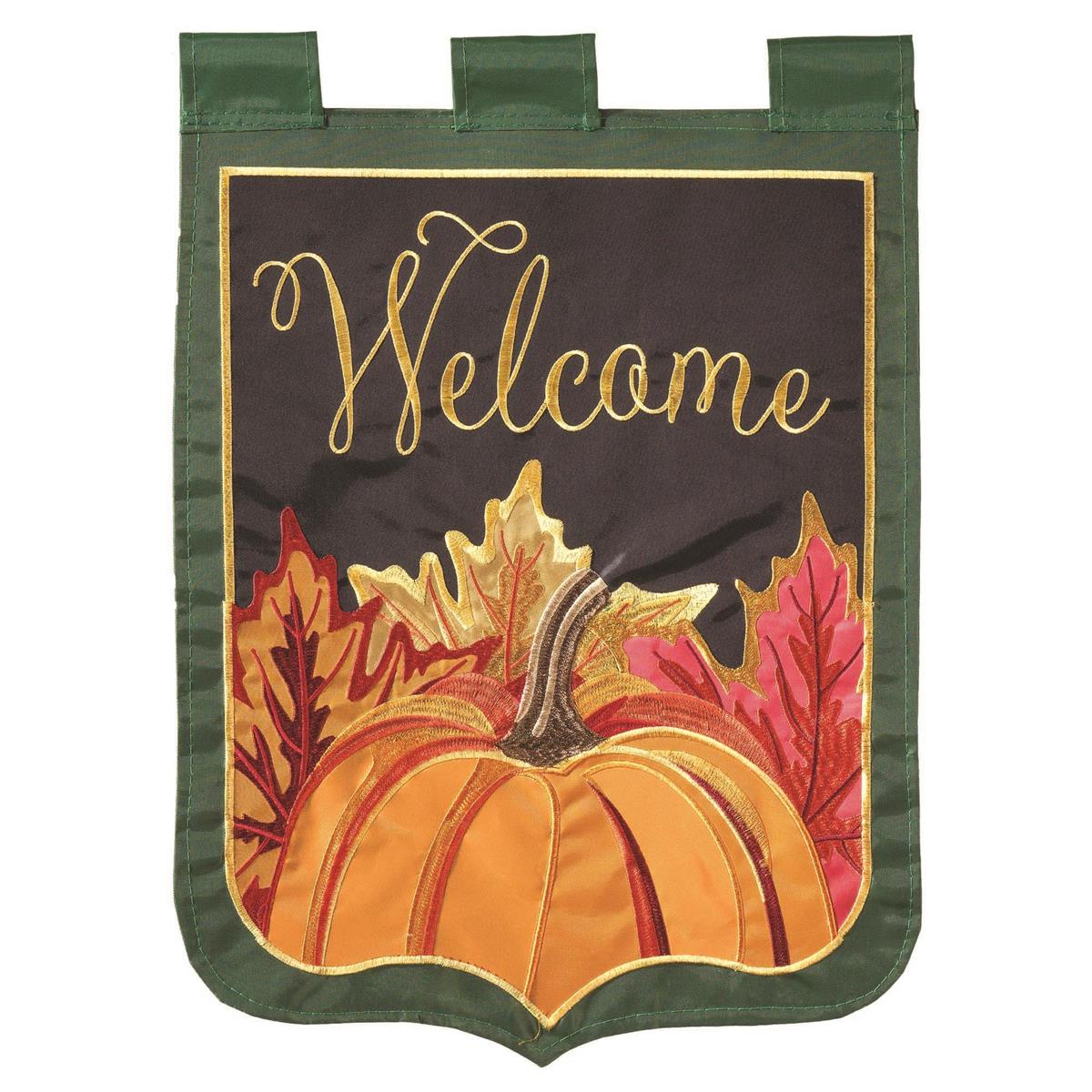 Pumpkins Welcome shaped garden flag featuring vibrant autumn colors and intricate embroidery, displayed outdoors on a garden pole.