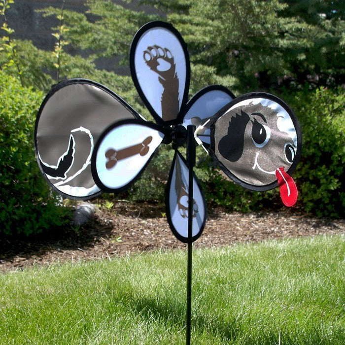 Puppy Baby Spinner featuring a cheerful puppy design, spinning on a pole in a colorful garden setting, designed for outdoor display.