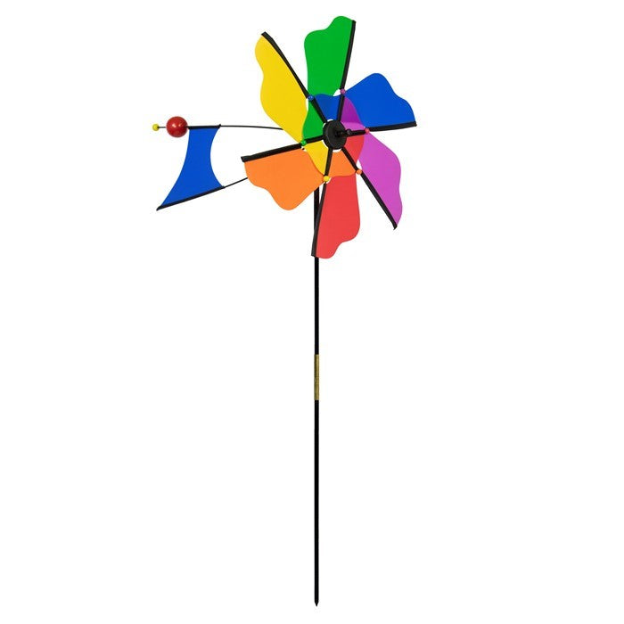 Rainbow Flower Windmill Ground Spinner featuring a colorful flower design, crafted from durable materials, spinning elegantly in the garden.