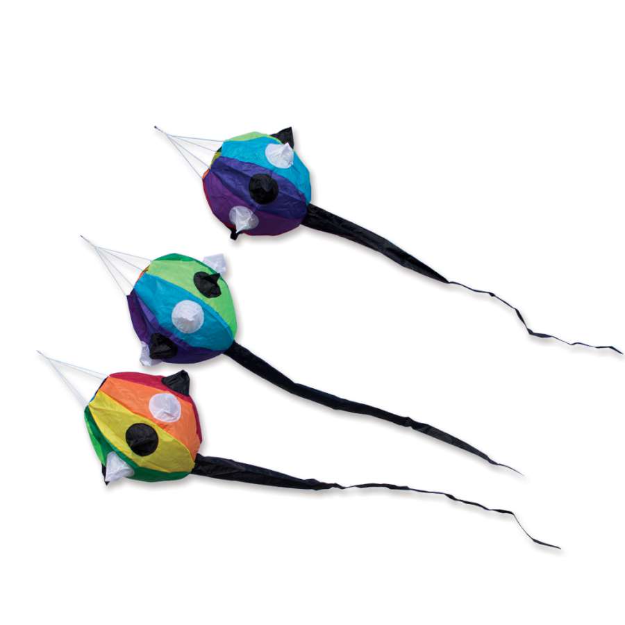 Rainbow Spikey Ball Set featuring three colorful, spiky balls attached to a vibrant kite line against a clear blue sky.