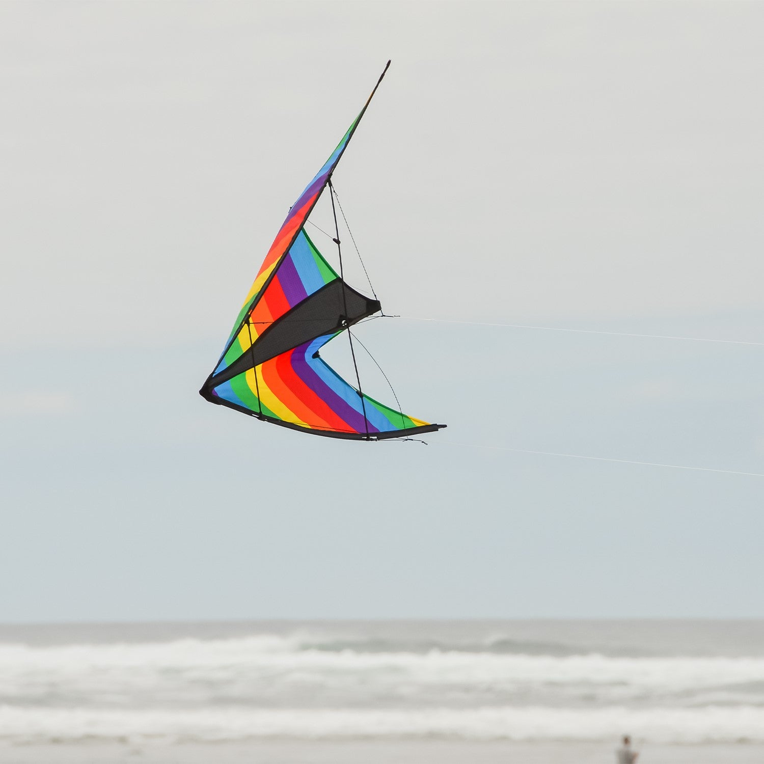 Rainbow Stripe 48" Sport Kite featuring colorful ripstop fabric and fiberglass frame, ideal for easy flying and tricks in various wind conditions.
