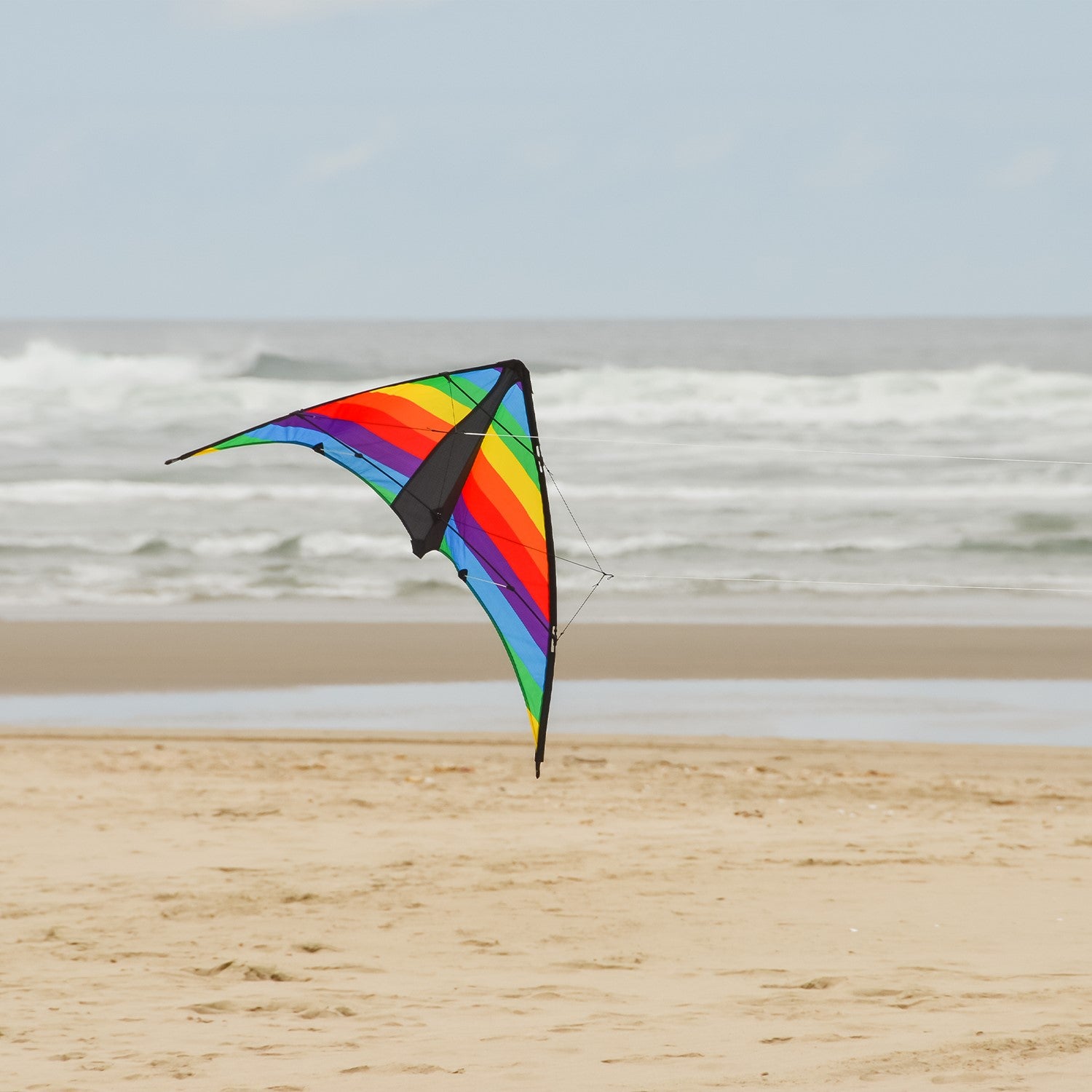 Rainbow Stripe 48" Sport Kite featuring colorful ripstop fabric and fiberglass frame, ideal for easy flying and tricks in various wind conditions.
