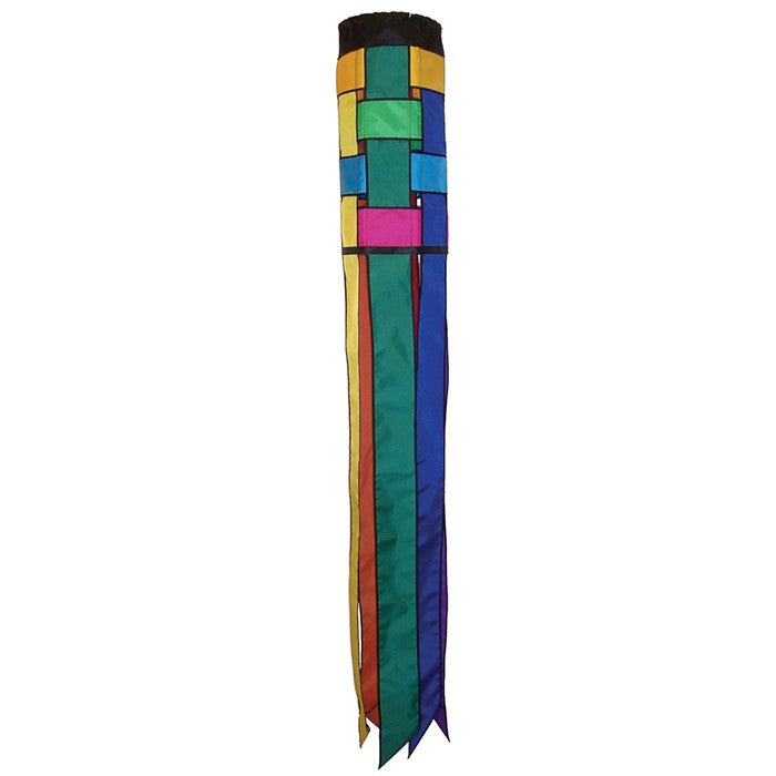 Rainbow Weave 60' Windsock displaying vibrant colors and coordinated tails, fluttering in the breeze against a clear sky.