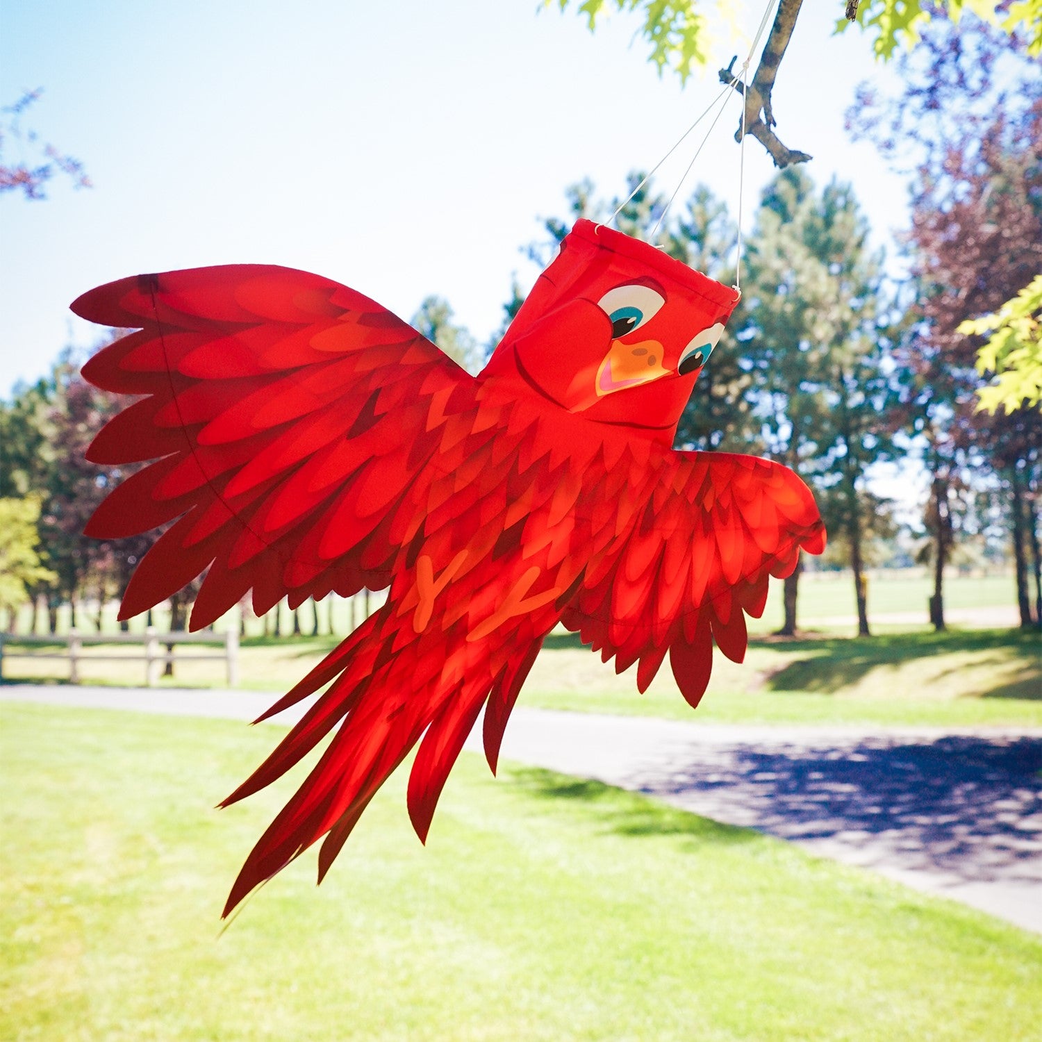 Red Bird Windsock in vivid colors, featuring permanently spread wings and an easy hanging system, enhances outdoor spaces with charm and joy.