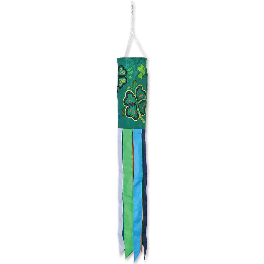 Shamrocks windsock displaying vivid green shamrock patterns, fluttering gracefully in the wind, adding festive charm to an outdoor setting.