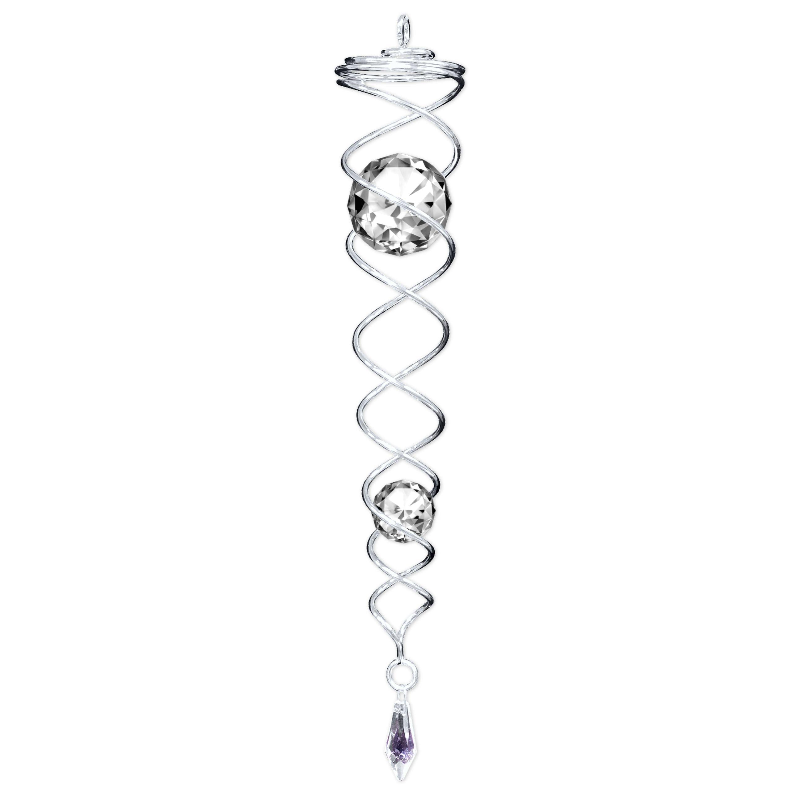 Silver Clear Crystal Twister featuring two sparkling crystals crafted from powder-coated stainless steel, elegantly displayed outdoors in a garden setting.