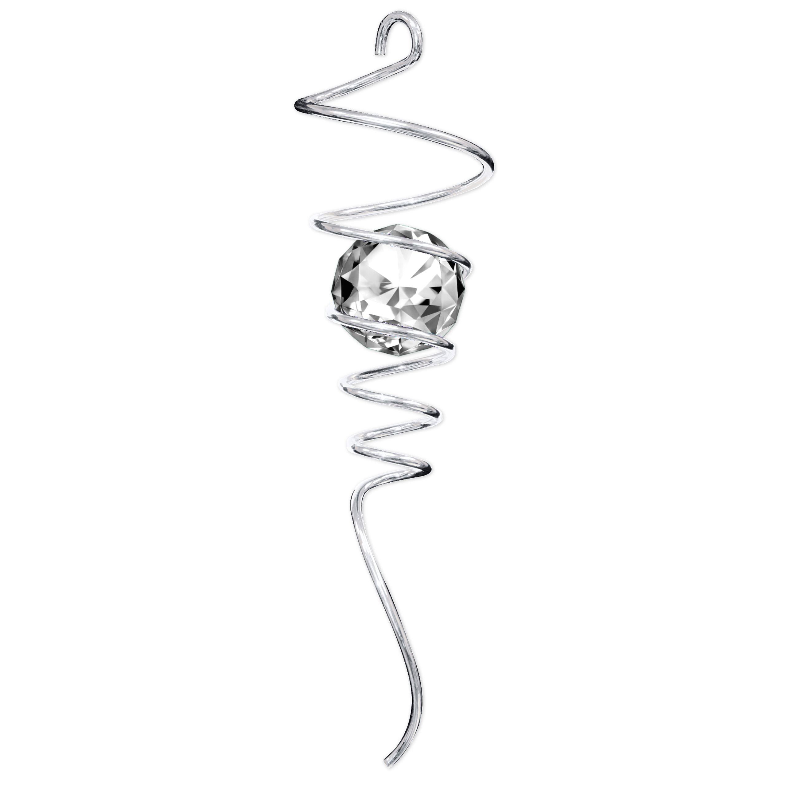 Silver Clear Tail featuring a spiral design and crystal accent catching light in an outdoor garden setting.
