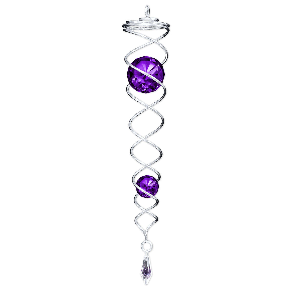 Silver Purple Crystal Twister in a garden setting, featuring two sparkling crystals that catch the light, creating motion and beauty.
