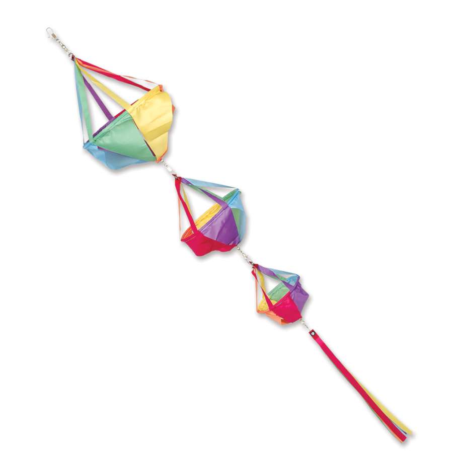 Small Spinnie Set - Circus featuring colorful and vibrant spinners with streamer tails, spinning gracefully in an outdoor garden.
