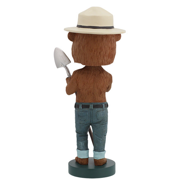 Smokey Bear Bobblehead, 7 inches tall with a friendly expression and ranger hat, showcasing an iconic American symbol for forest fire prevention.