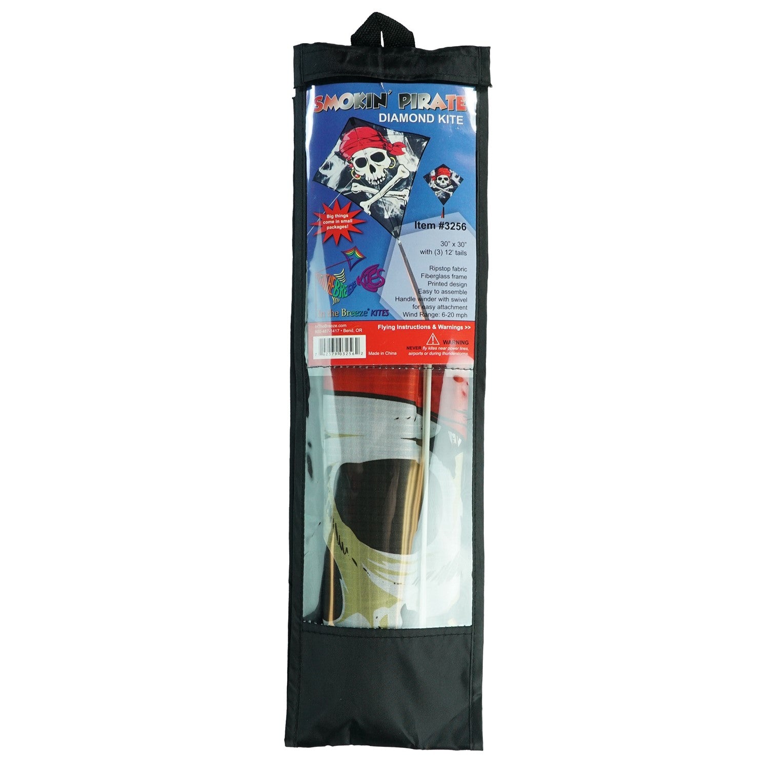 Smokin' Pirate 30" Diamond Kite with a Jolly Roger design flying against a clear blue sky, featuring three long colorful tails.