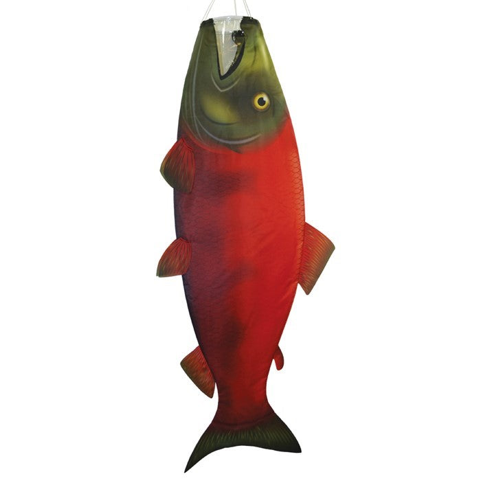 Sockeye Salmon 48-inch Fish Windsock featuring vibrant colors and detailed design, fluttering in the breeze at a marina.